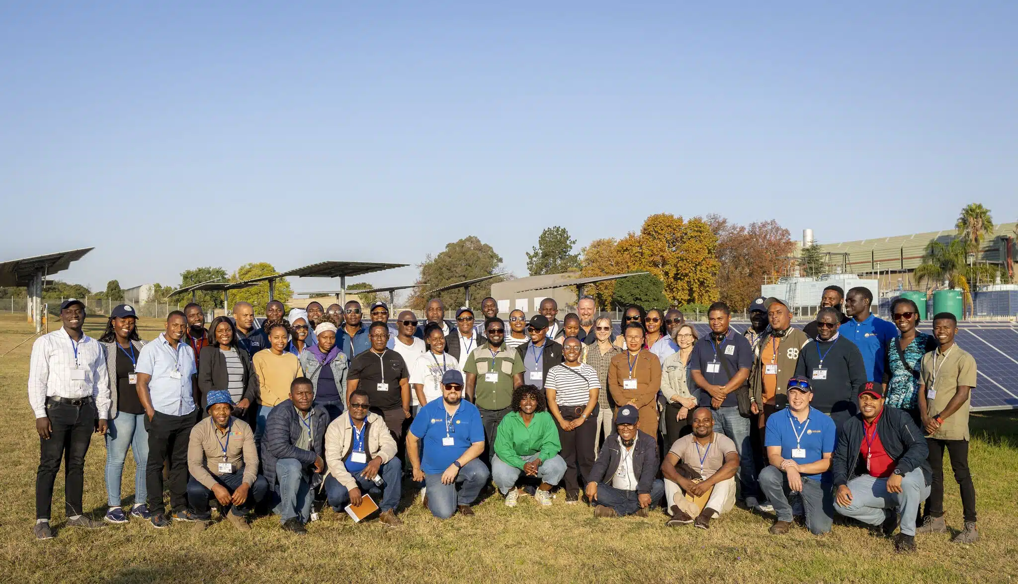 Participants group picture at the CSIR solar plant site.
