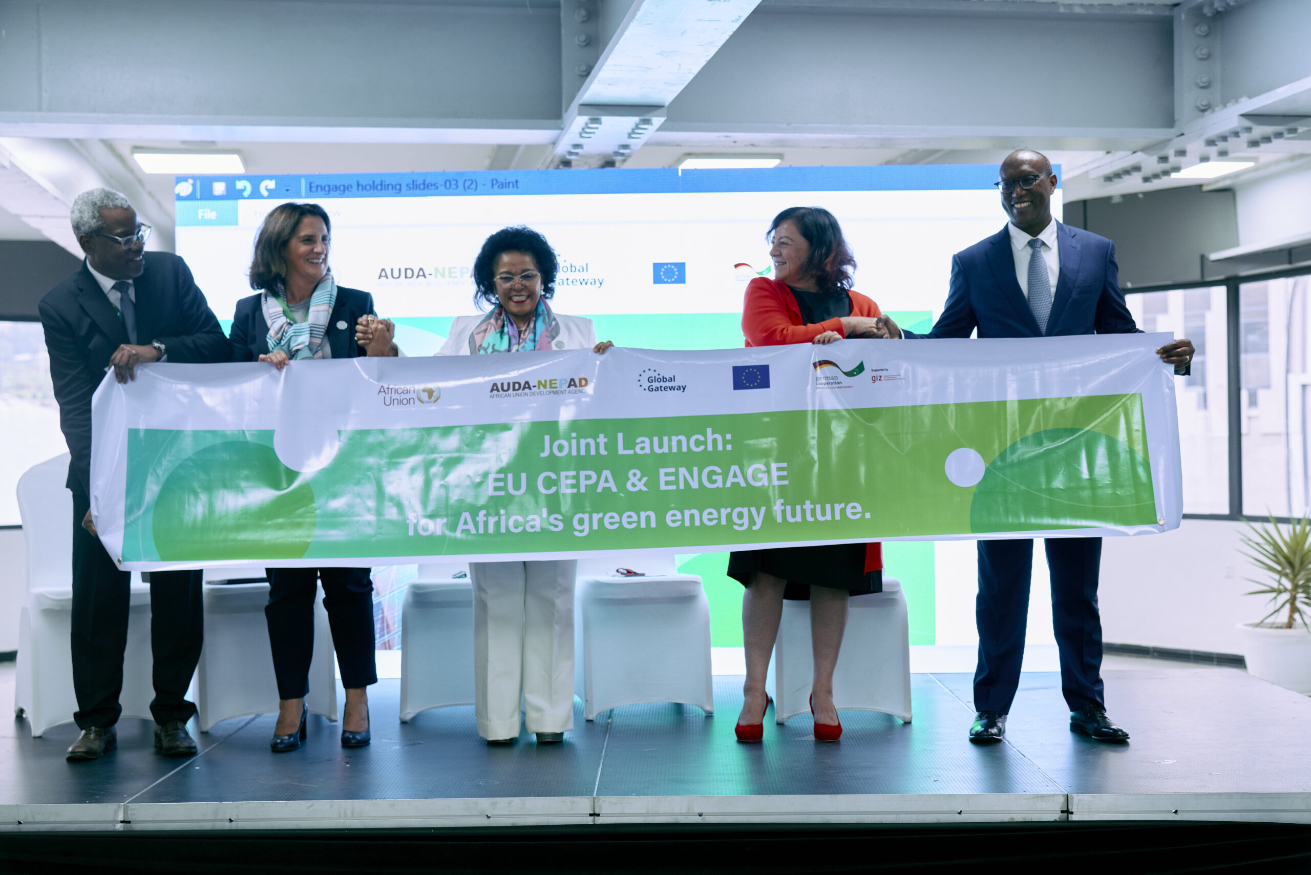 High-level panelists holding the joint banner of the CEPA and ENGAGE programmes at the 2nd Africa Climate Summit in September 2025